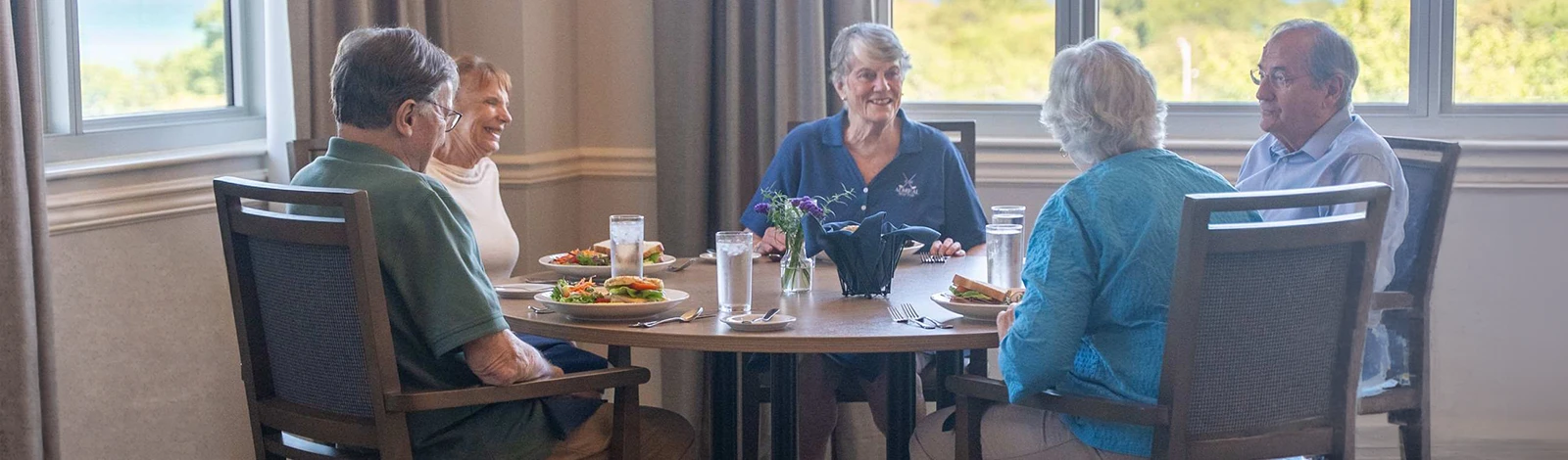 dining-hero Residents at dining table